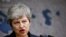 U.K. - Britain's Prime Minister Theresa May speaks at Chatham House in London, Britain July 17, 2019