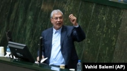 IRAN -- Iranian Labor Minister Ali Rabiei speaks during his impeachment hearing in an open session of parliament, in Tehran, August 8, 2018