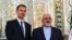 Iranian Foreign Minister Mohammad Javad Zarif (right) with U.K. Foreign Secretary Jeremy Hunt in Tehran on November 19