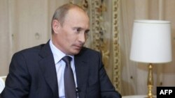 Russian Prime Minister Vladimir Putin gives an interview to Abkhaz media in Sochi on August 12 ahead of his trip.