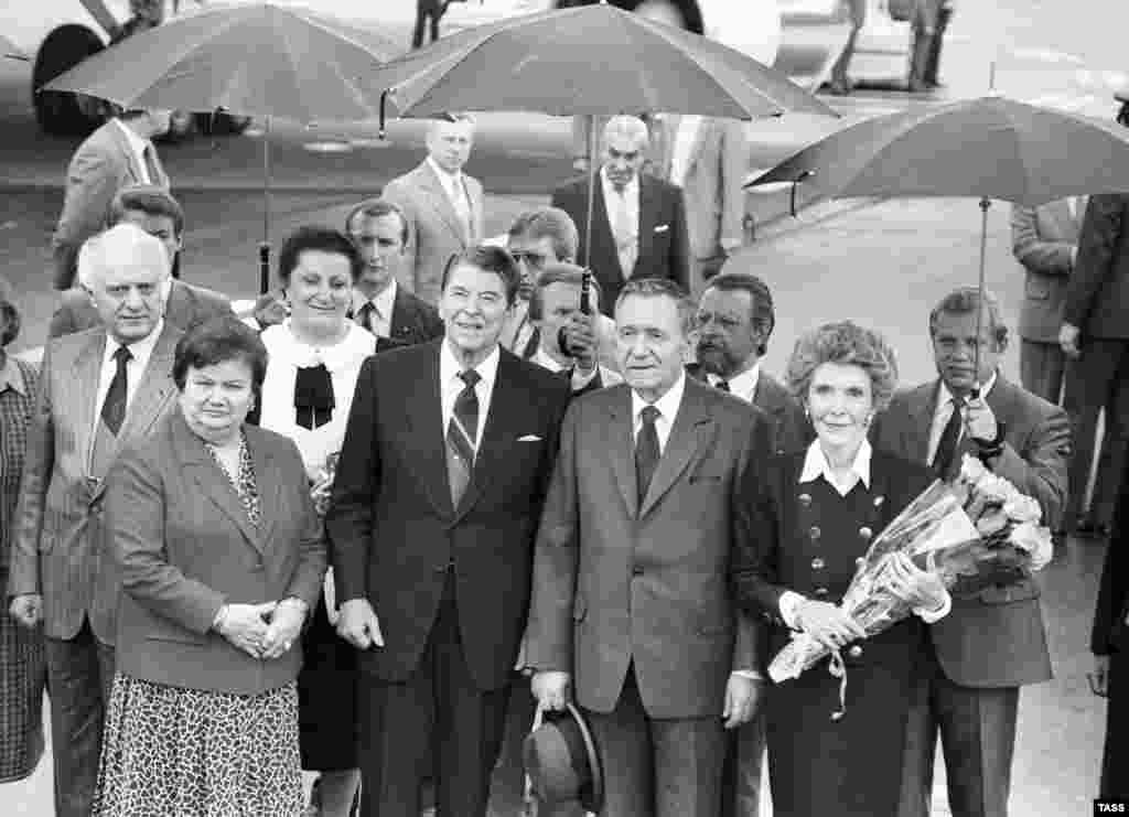 Soviet Foreign Minister Eduard Shevardnadze and other officials welcome U.S. President Ronald Reagan and First Lady Nancy Reagan in 1988 in Moscow.