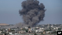 Tym i zi del nga ndërtesat në Rripin e Gazës gjatë sulmeve ajrore izraelite, maj 2024.