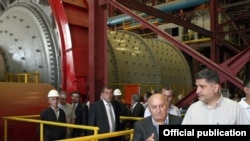 Armenia - Prime Minister Tigran Sarkisian (R) visits a metallurgical enterprise in Kajaran, 10Sept2011.