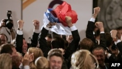 The Russian delegation cheers Sochi's selection in 2007 to host the 2014 Winter Olympics.