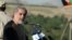 Afghan presidential candidate Abdullah Abdullah addresses supporters during an election campaign rally in the Paghman district of Kabul Province on June 9.