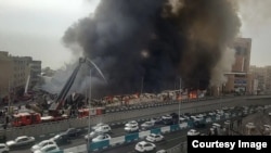 نمایی از آتش‌سوزی در بازار جنت در غرب تهران