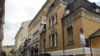 София, ул. "Ангел Кънчев" 3 (жълтата сграда в дясната част на снимката).