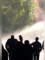Police, Protesters Clash In Pristina As Lawmakers Debate Bill On War Crimes Court
