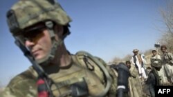 A U.S. soldier takes part in a foot patrol in Kandahar Province in early January.