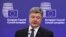 Ukrainian President Petro Poroshenko speaks during a press conference prior to a meeting at EU headquarters in Brussels on December 16. 
