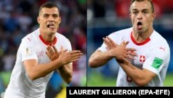 Switzerland players Granit Xhaka (left) and Xherdan Shaqiri making the eagle emblem of Albania during their World Cup game against Serbia.