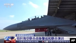 Kineski vojni avion koji je učestvovao prošli vikend u vojnim vežbama u blizini Tajvana, 19. avgust 2023. 
