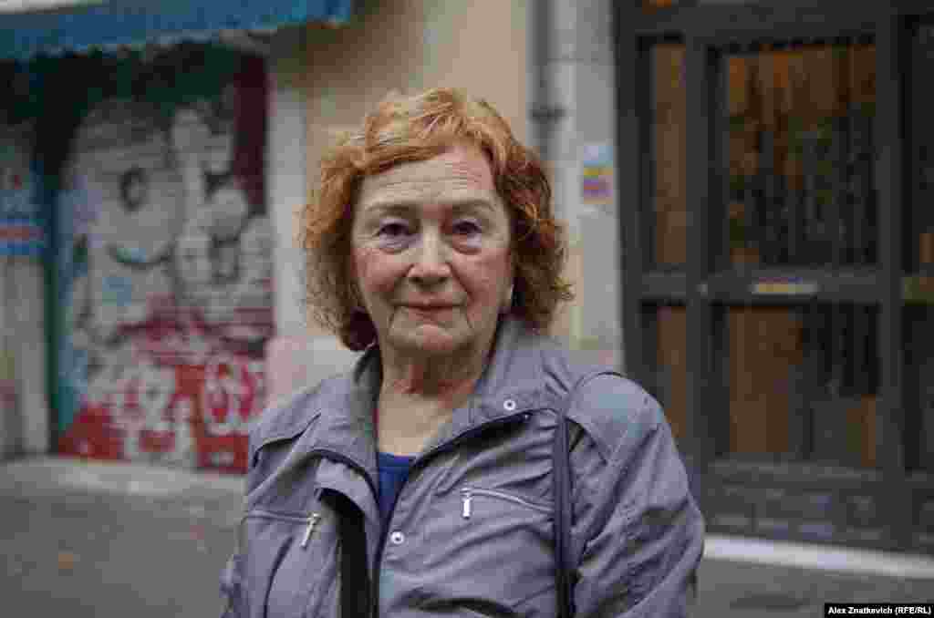 This woman agreed to be photographed, but declined to give her name. She said: &quot;We are being strangled. The Spanish government strangles us and takes our money.&quot;