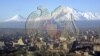 Armenia - A picture of the Armenian coat of arms against the background of Yerevan and Mount Ararat, 5Jul2011.