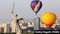 In Volgograd, hot-air balloons float by the Motherland Calls monument commemorating the Battle of Stalingrad.