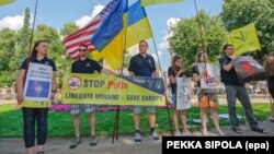 Протест у столиці Фінляндії, де зустрілися президенти США та Росії. Гельсінкі, 16 липня 2018 року