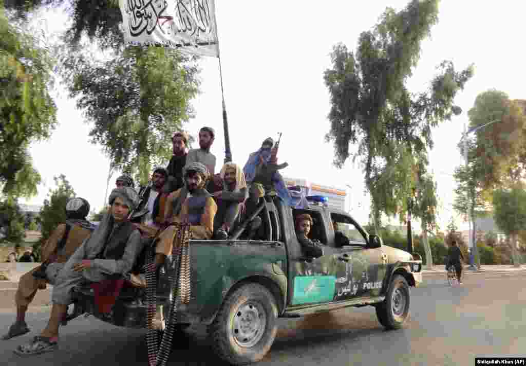 Taliban fighters patrol inside the Afghan city of Kandahar, which is now under the control of the militant group.&nbsp;