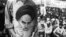 A supporter holds a portrait of Ayatollah Khomeini in 1979 (photo by Reza Deghati) 