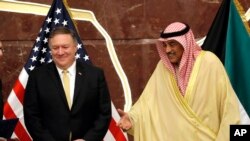 U.S. Secretary of State Mike Pompeo and Kuwait's Foreign Minister Sheikh Sabah Al-Khalid Al-Sabah are seen during a news conference in Kuwait City, Kuwait, Wednesday, March 20, 2019. (Jim Young/Pool Photo via AP)