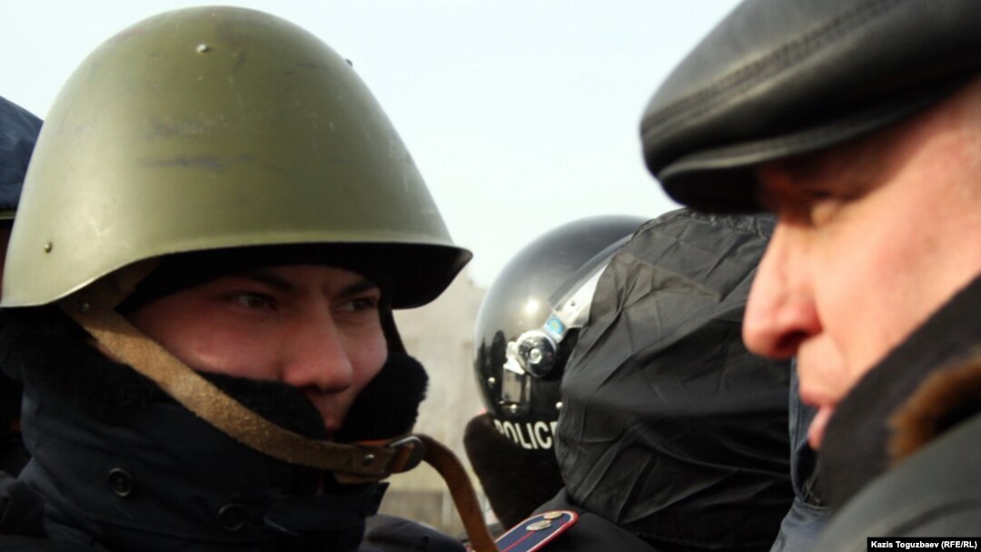 Police have raided the home of opposition leader Vladimir Kozlov (pictured right) 
