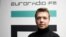 BELARUS -- Belarusian journalist Raman Pratasevich poses for a photo in front of euroradio.fm sign in Minsk, November 17, 2019