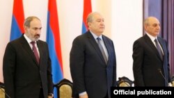 Armenia -- Armenian President Armen Sarkissian (C) and Prime Minister Nikol Pashinian (L) and Karabakh President Bako Sahakian attend a meeting in Yerevan, June 18, 2019.