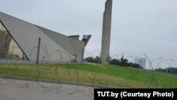 Belarus -- Barbed wire stretched around the stele