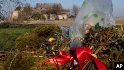 A stuffed toy is left as a tribute at the spot where Saman Abbas's body was found in northern Italy in November 2022, nineteen months after she had disappeared.