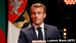 LITHUANIA -- French President Emmanuel Macron gives a speech as he is granted an honorary doctorate of the University in Vilnius, September 29, 2020