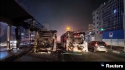 Iran - Burnt vehicles lie on a road in Tehran following unrest sparked by dire economic conditions, in this screengrab from Iran's state media broadcast footage, January 10, 2026.