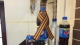 Ukraine, Crimea - Pepsi with St. George ribbon in a cafe