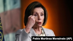 House Speaker Nancy Pelosi of Calif., gestures while speaking during a news conference on Capitol Hill in Washington, October 17, 2019