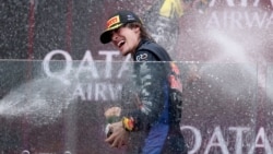 Никола Цолов ликува след победата си в първото състезание от новия сезон на Формула 2 на пистата "Албърт Парк" в Мелбърн, Австралия, 8 март 2026 г.