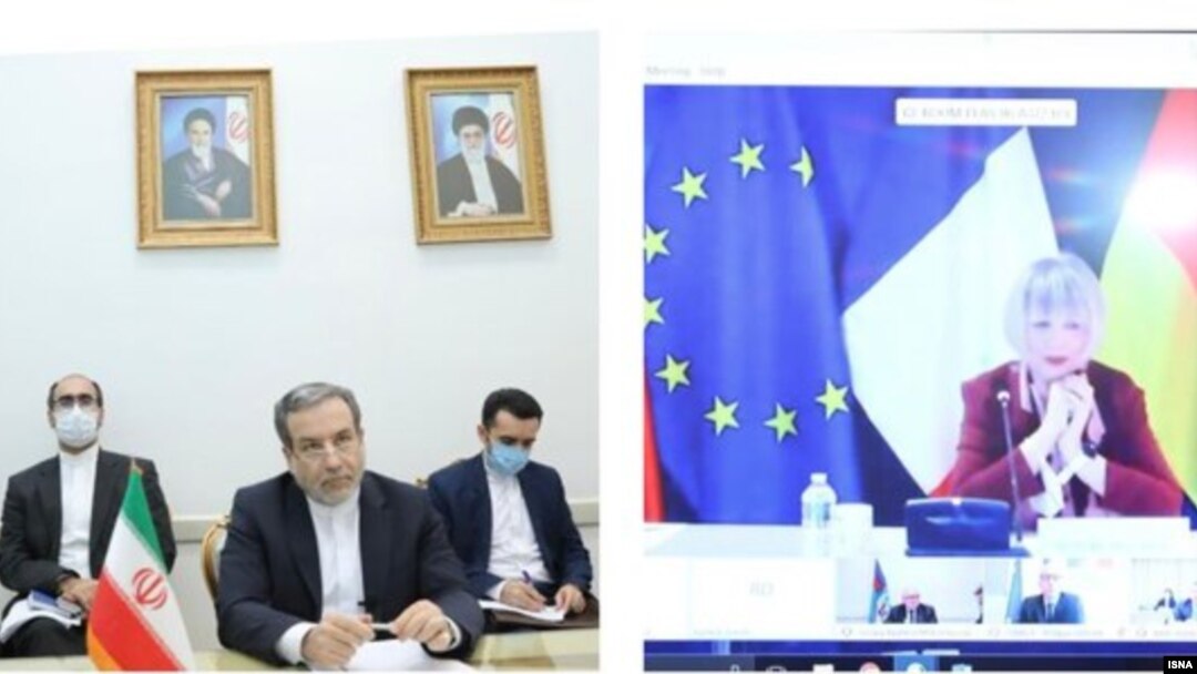 هلگا اشمیت (راست) هماهنگ‌کننده کمیسیون مشترک برجام و عباس عراقچی، معاون وزیر خارجه ایران