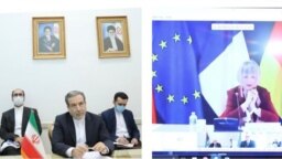 هلگا اشمیت (راست) هماهنگ‌کننده کمیسیون مشترک برجام و عباس عراقچی، معاون وزیر خارجه ایران