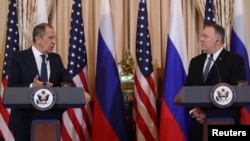 Russia’s Foreign Minister Sergei Lavrov (left) and U.S. Secretary of State Mike Pompeo hold a joint news conference at the State Department in Washington on December 10.