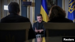 Ukraine's President Zelenskyy speaks during an interview with Reuters in Kyiv.