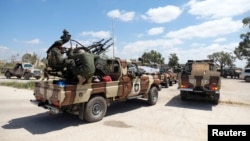 Отряд ЛНА Халифы Хафтара, выступающий из Бенгази на боевые позиции в окрестностях Триполи. Апрель 2020 года
