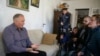 Mikalay Statkevich speaks to journalists at his home in Minsk on March 27.