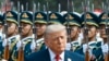 US President Donald Trump inspects an honor guard during a ceremony in Beijing on May 14.