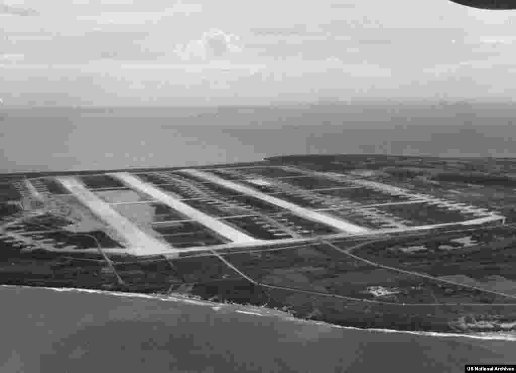 Airfields on Tinian Island seen in 1945.After Tinian’s capture, a massive construction campaign began that included laying kilometers of runway made from crushed coral.