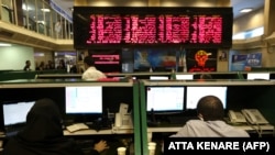 Iranian traders work at Tehran Stock Exchange on July 1, 2019.