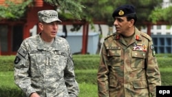 General David Petraeus (left, with Pakistani General Ashfaq Kayani) also repeated his view that the drawdown in U.S. and NATO forces, scheduled to begin in July 2011, will not result in a swift withdrawal.