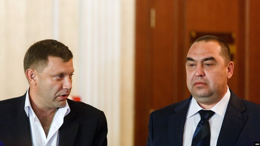 Aleksandr Zakharchenko (left) and Igor Plotnitsky in Minsk in September (file photo)