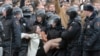 Russia – Russian riot policemen detain a demonstrator during an opposition rally in central Moscow, Russia, 26 March 2017