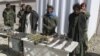 Afghan authorities present captured Taliban insurgents in Ghazni province last March. Now, local villagers from the same area have formed their own militia to take on the militants by themselves. 