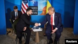 Predsednici Ukrajine i SAD, Volodimir Zelenski i Donald TRampa, na marginama samita u NATO u Hagu, 25. jun 2025.