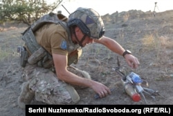 Andriy demonstrating how to disarm a weaponized kamikaze drone.