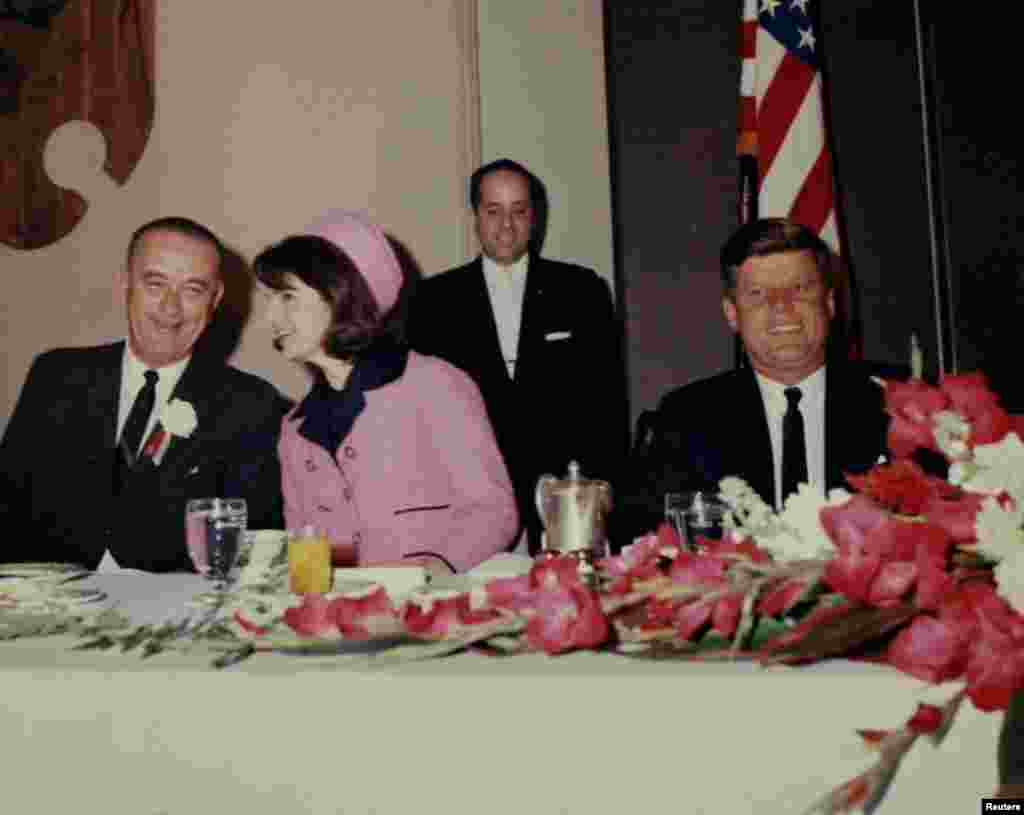 President John F. Kennedy attends a breakfast in Fort Worth, Texas with Vice President Lyndon Johnson and first lady Jacqueline Kennedy just hours before his assassination on November 22, 1963.