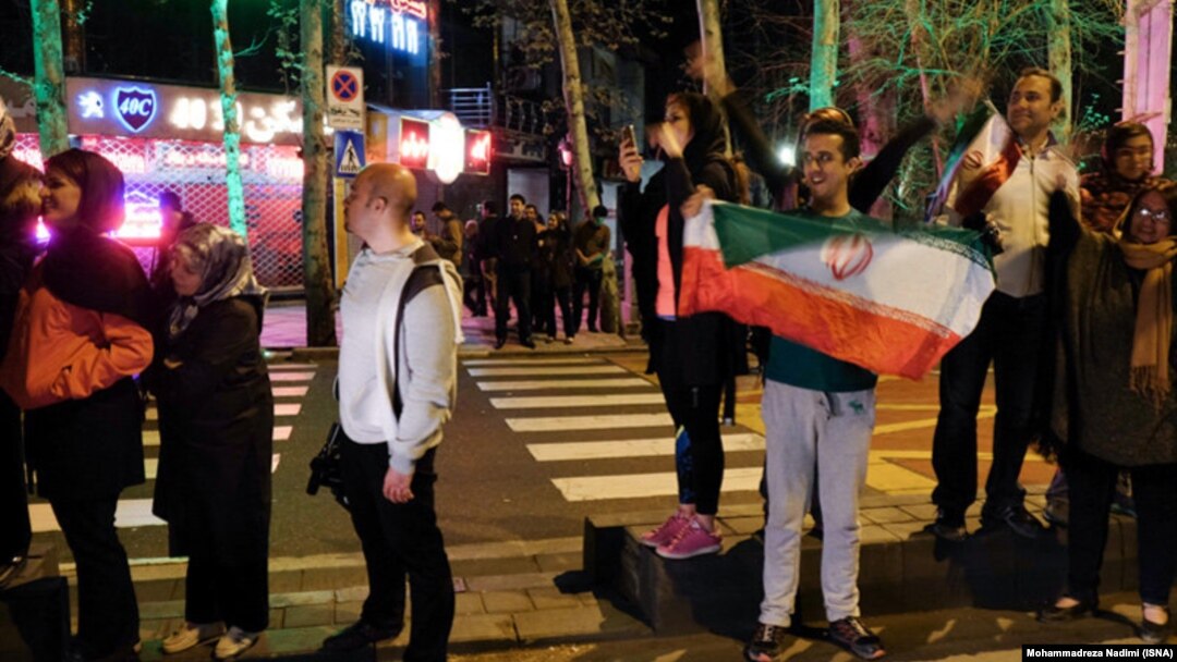 People in Tehran celebrate after news of the agreement reached between Iran and world powers in Lausanne on April 2.